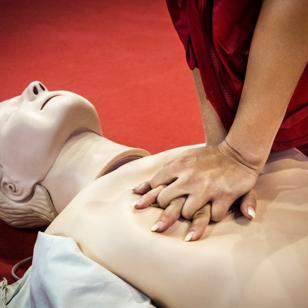 Doing CPR on a dummy