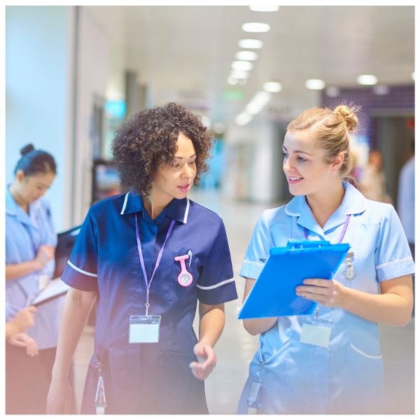 two nurses talking to each other